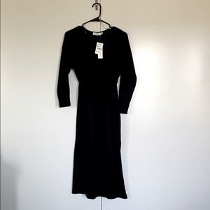 Cozy black, long sleeve knit dress.